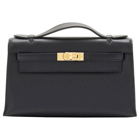 kelly clutch vs Hermes pochette